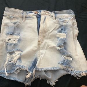 Light Washed Ripped Jean Shorts from Fashion Nova